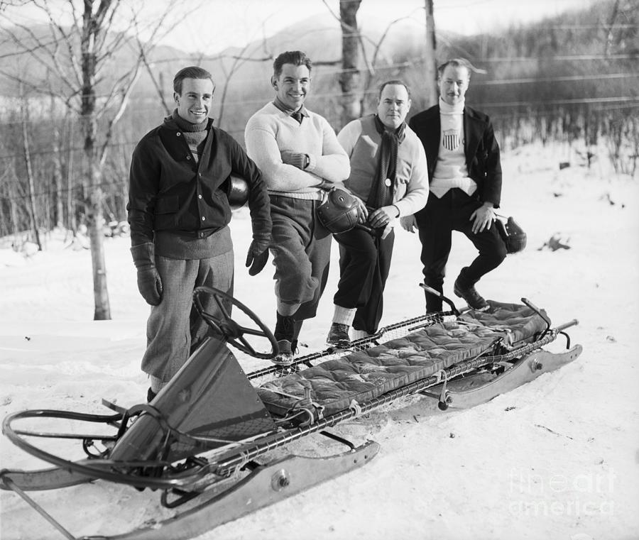 Olympic Bobsled Team In Front Of Bobsled Photograph by Bettmann
