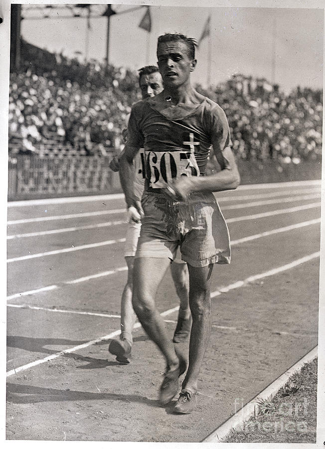Olympic Walkers During 10,000 Meter Race Photograph by Bettmann