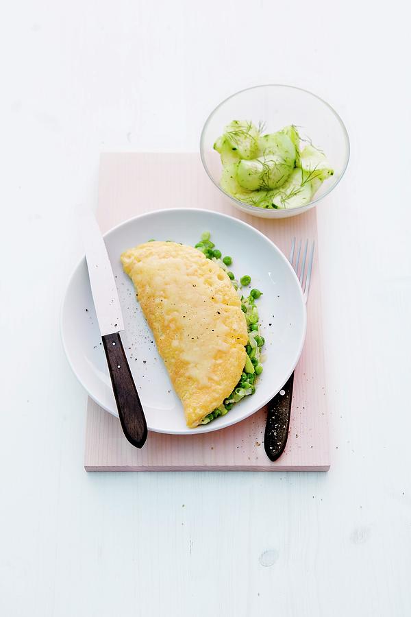Omelette Verde with Peas And Spring Onions And Cucumber Salad Photograph by Michael Wissing