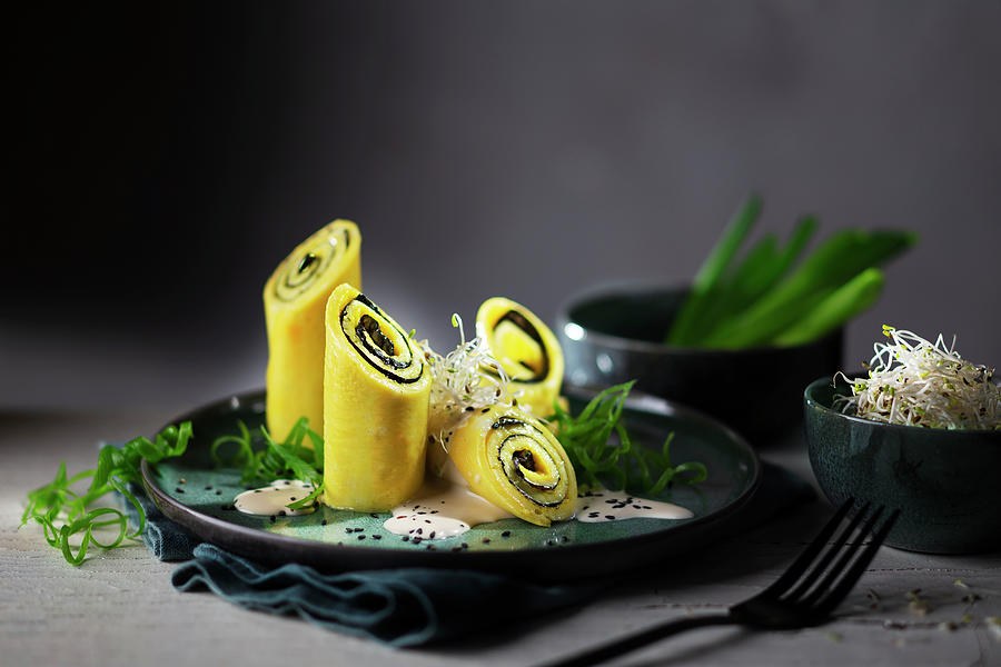 Omelette With Nori Leaves And Sprouts Photograph by Christian Schuster
