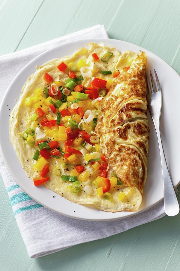 Omelette With Peppers And Cheese Photograph by Jonathan Short