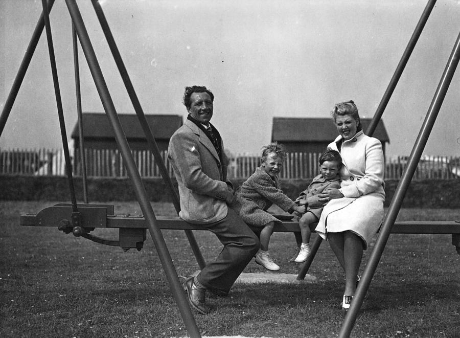 On The Swings Photograph by H. F. Davis