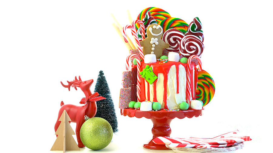On trend Candy land Christmas drip cake. Photograph by Milleflore Images