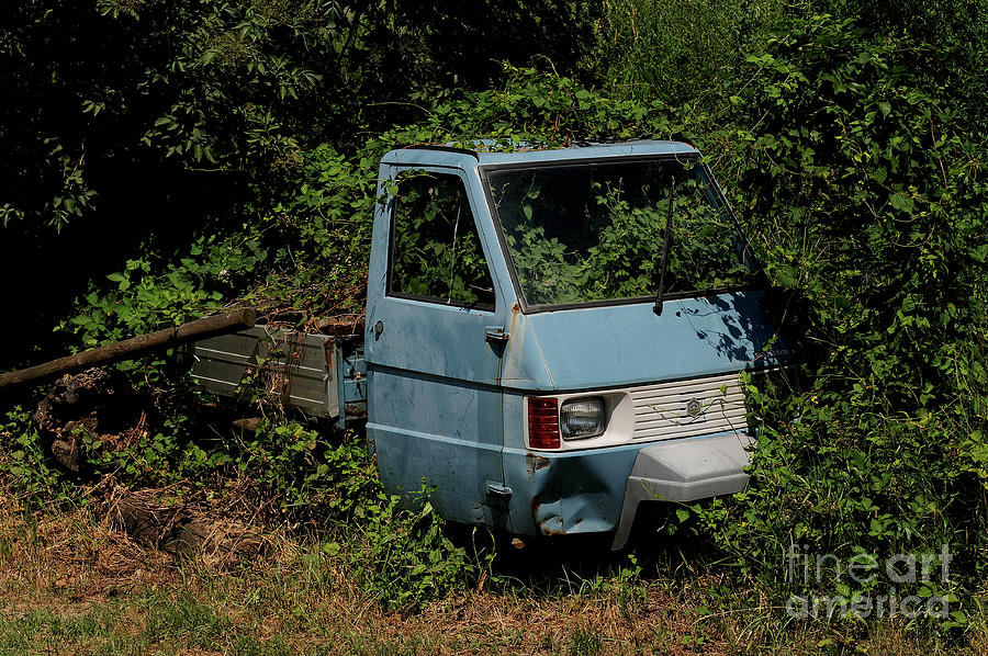 Dumped Piaggio Ape 3 wheel pickup, based Vespa scooter, Pont Saint Martin, Valley, Italy Photograph by Kerr -