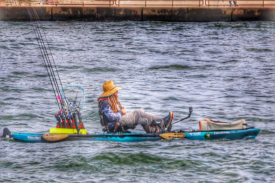 One man paddle fishing boat by Bill Rogers