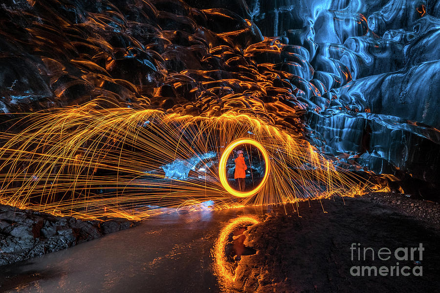 One Man Spinning The Fire In Ice Cave Photograph by Singhaphanallb