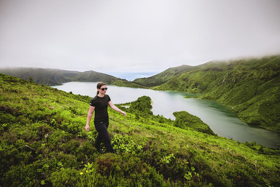 Nature Photograph - One Woman Walks On Hiking Trail Near Lagoa Do Fogo, Azores by Cavan Images / Chris Bennett