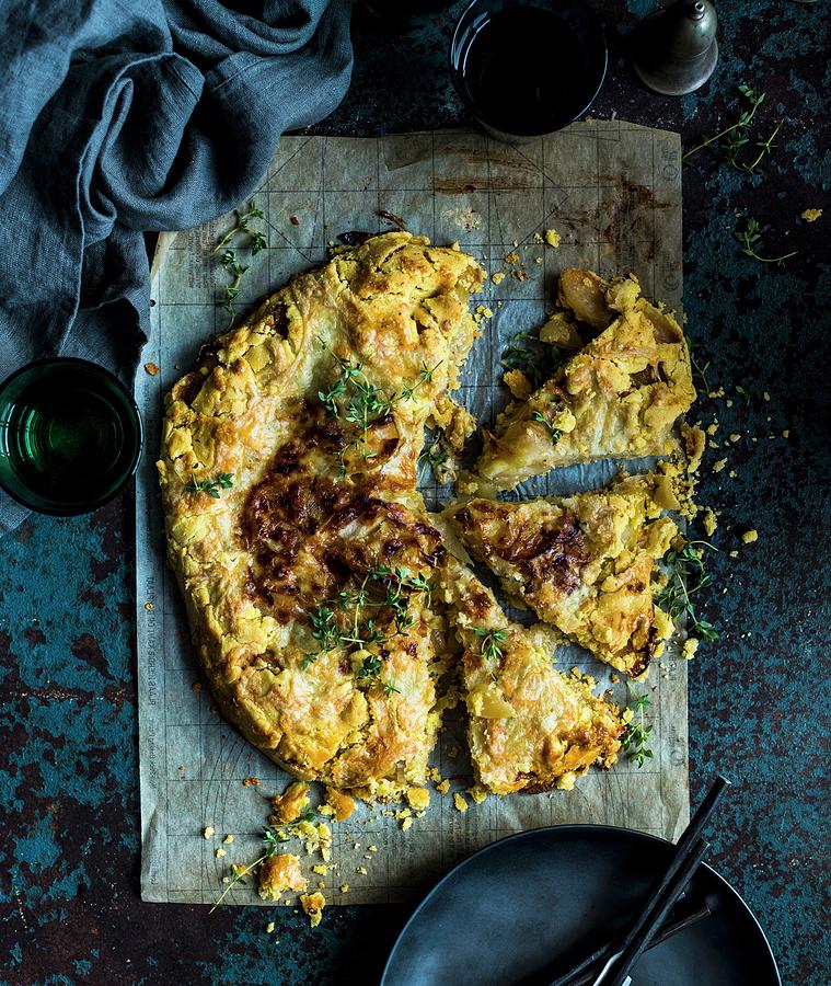 Onion And Cheese Galette Photograph by Hein Van Tonder