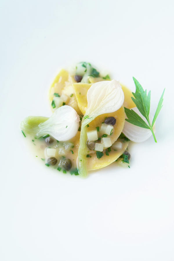 Onion Ravioli With A Light Potato And Loveage Broth Photograph by Michael Wissing