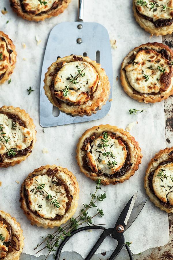 Onion Tartlets With Goats Cheese And Thyme Photograph by The Food Union