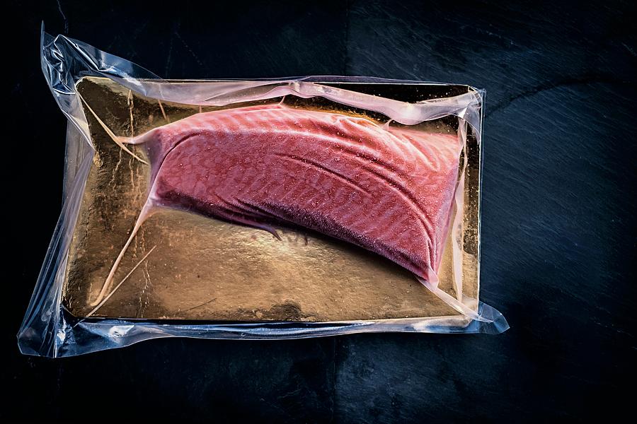 Online Fish Supplier: Shock-frosted Loin Fillet Of Salmon In Its Packaging Photograph by Jalag / Pieter-pan Rupprecht