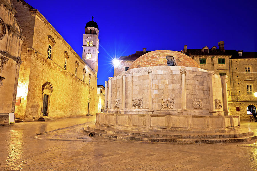 Onofrio Fountain and Stradun street in Dubrovnik evening view Photograph by Brch Photography