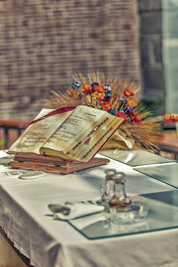 open Bible on the altar of Catholic Church Photograph by Vivida Photo ...