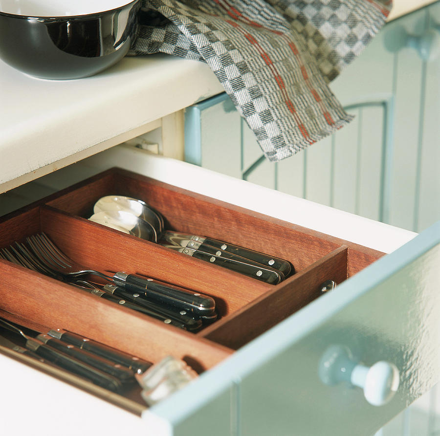Open Cutlery Drawer In Kitchen Photograph by Luc Wauman
