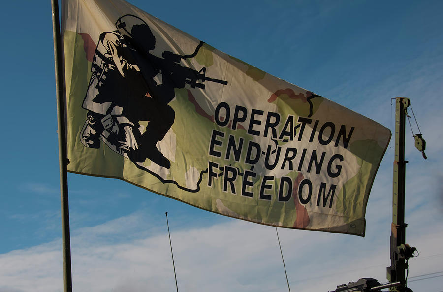 Flag Photograph - Operation Enduring Freedom flag blowing in the breeze by Flees Photos