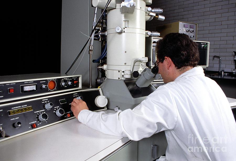 Operator Using Tem Machine Photograph by David Leah/science Photo Library