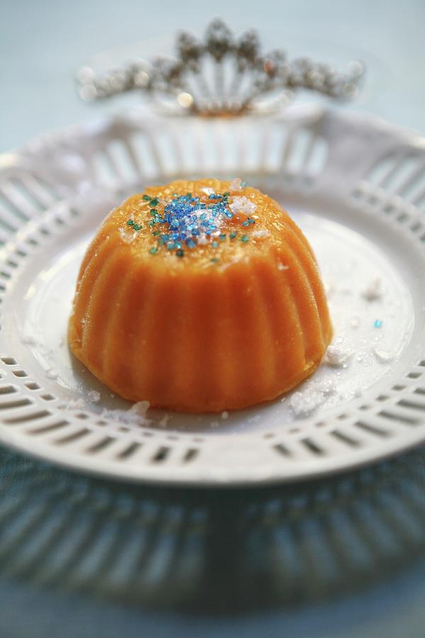 Orange And Carrot Pudding With Coloured Sugar Sprinkles Photograph by Viola Cajo