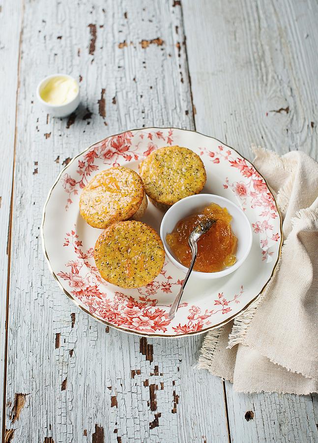 Orange And Poppy Seed Muffins With Marmalade Photograph by Ewgenija Schall