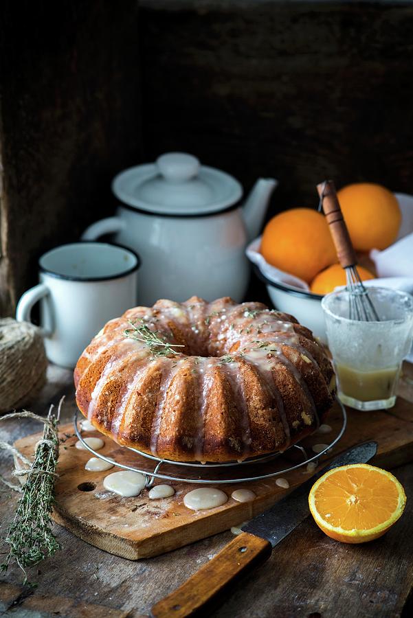 Orange And Thyme Bundt Cake Photograph by Irina Meliukh
