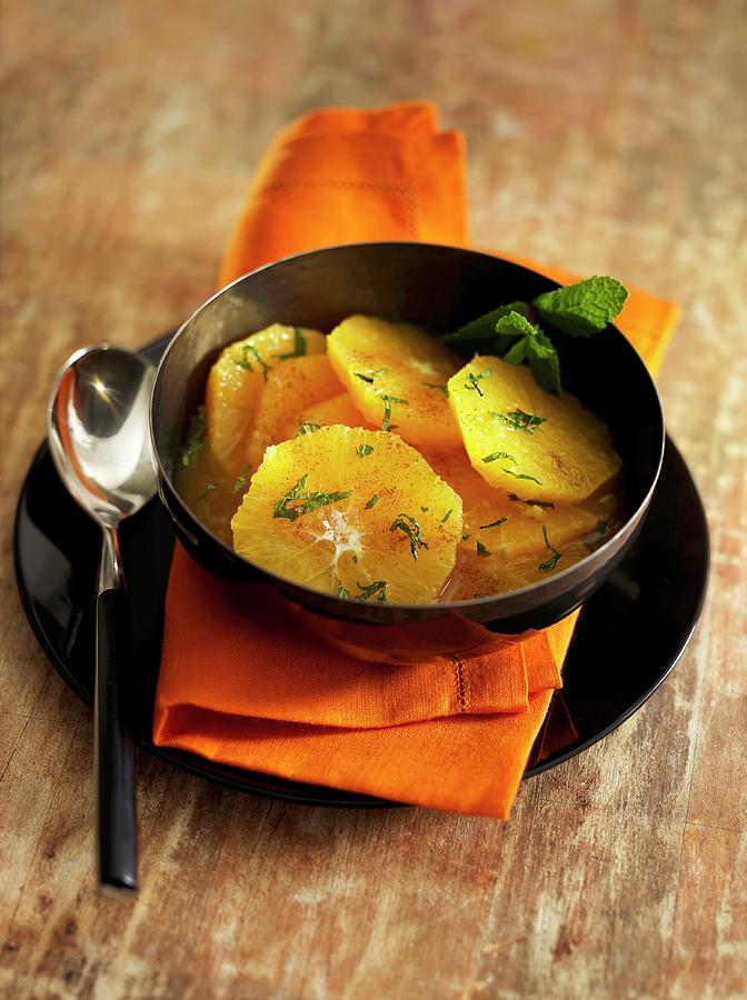 Orange Fruit Salad With Cinnamon And Mint Photograph by Hall