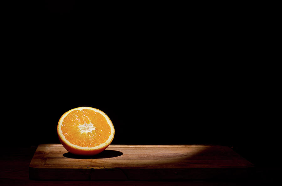 Orange In Spotlight Photograph by Nicole White