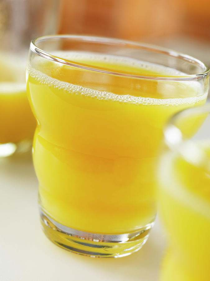 Orange Juice In A Glass close-up Photograph by Jim Scherer