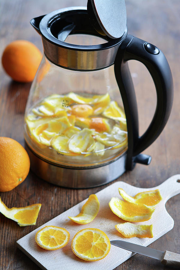 Orange Peel In A Kettle For Descaling Photograph by Mariola Streim