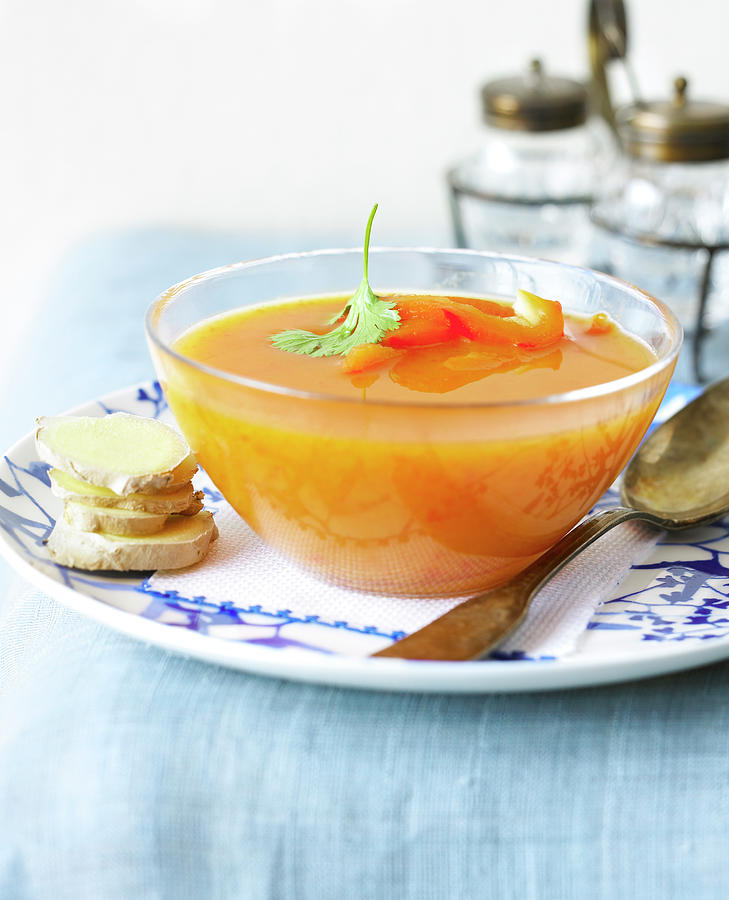 Orange Pepper And Ginger Soup Photograph by Radvaner