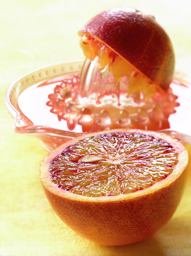 Juice Photograph - Orange Sanguine Pressee Squeezing A Blood Orange by Studio - Photocuisine