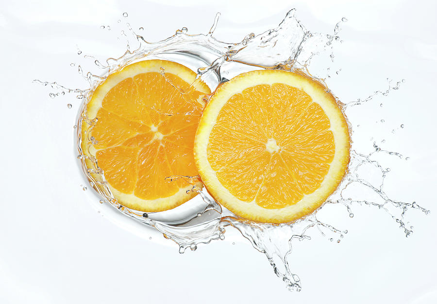 Orange Slices Splash Photograph by Chris Stein