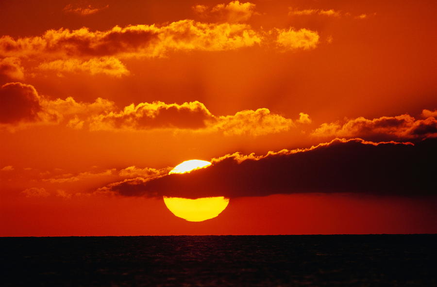 Orange Sunset With Dark Clouds Over by Bert Blokhuis