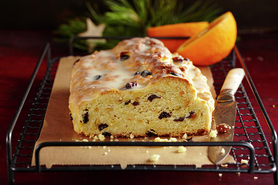 Orange Yeast Dough Stollen With Icing For Christmas Photograph by Teubner Foodfoto