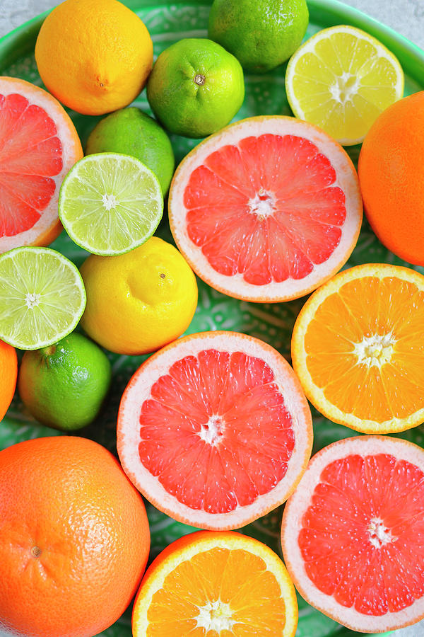 Oranges Grapefruit Limes Lemons On A Tray Cocktail Citrus Photograph by Karolina Smyk