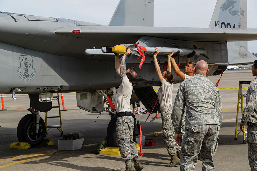 Oregon Air National Guard Crews Load Photograph by Rob Edgcumbe