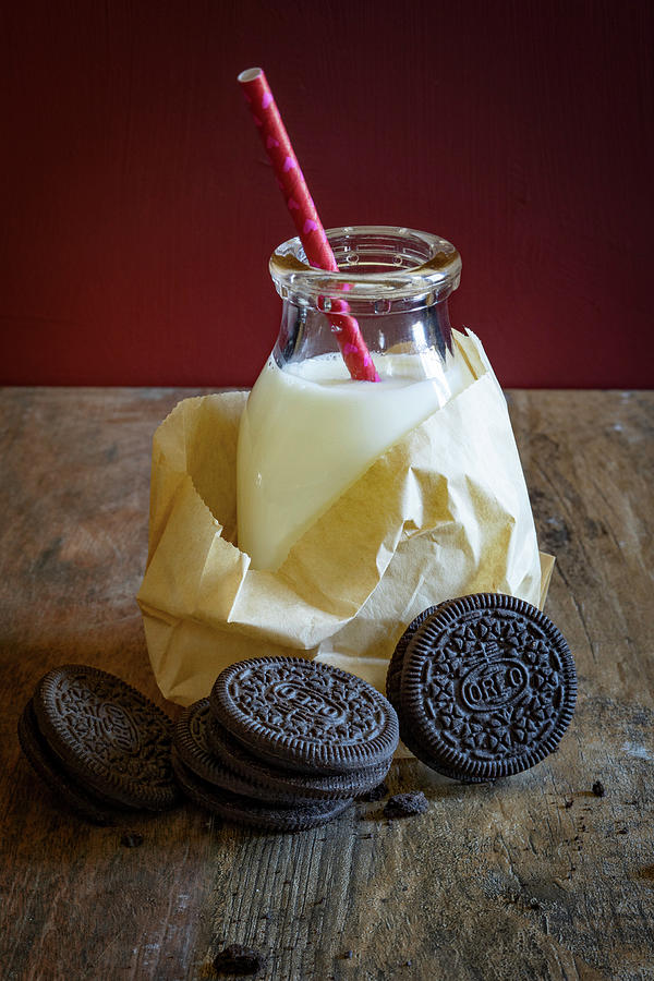 Oreo Cookies And A Bottle Of Milk Photograph by Eising Studio