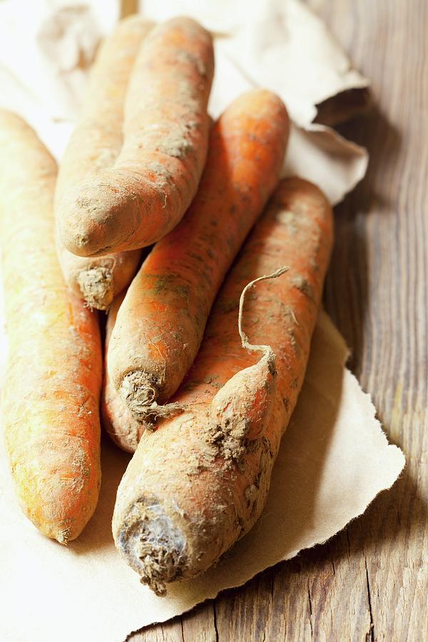 Organic Carrots With Soil Photograph by Hilde Mche