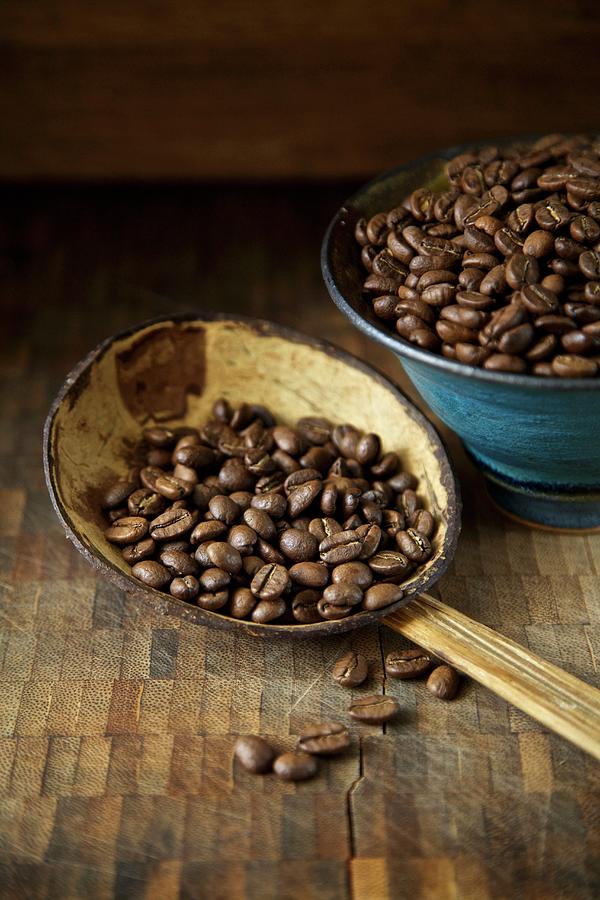 Organic Coffee Beans On A Rustic Spoon Photograph by Andre Baranowski