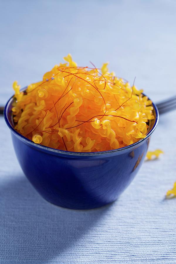 Organic Spirelli Made From Corn Flour With Saffron Threads gluten Free Photograph by Mandy Reschke