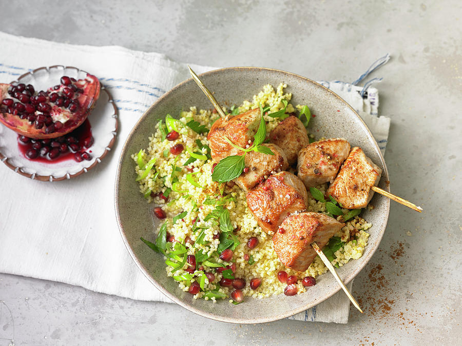 Oriental Chicken Kebab With Couscous And Pomegranate Seeds Photograph by Nikolai Buroh