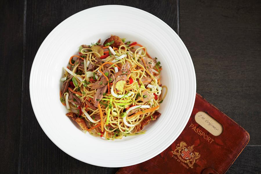 Oriental Egg Noodles With Carrots, Spring Onions And Duck Photograph by Charlotte Tolhurst