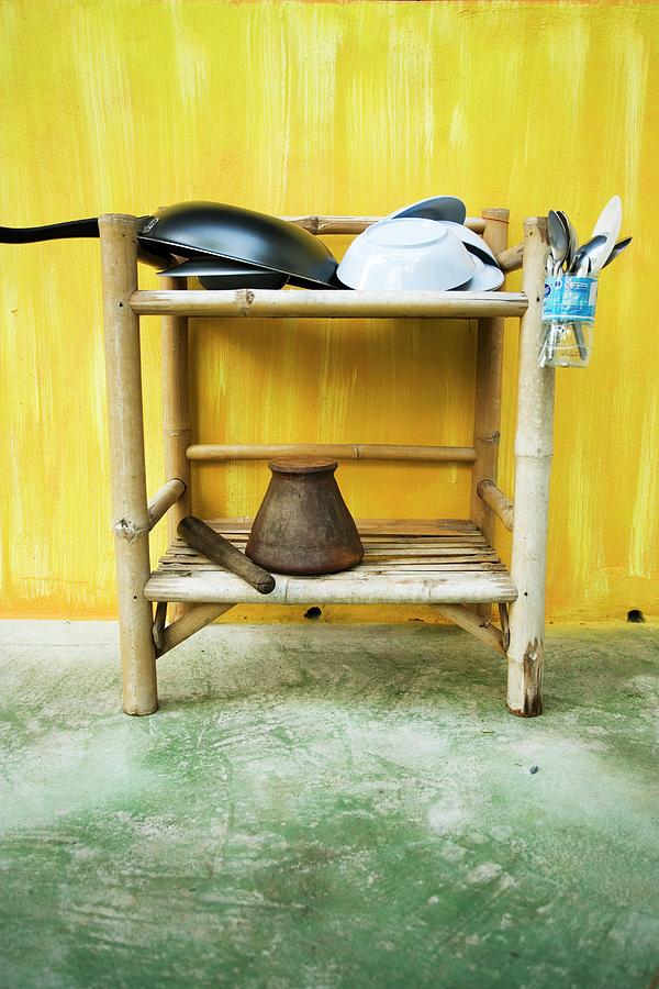 Oriental Kitchen Utensils On A Small Wicker Shelf Photograph by Michael Wissing