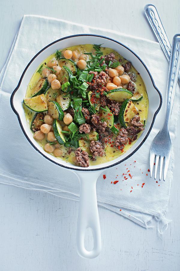 Oriental Omelette With Mincemeat, Chickpeas And Courgette Photograph by Jalag / Stefan Bleschke
