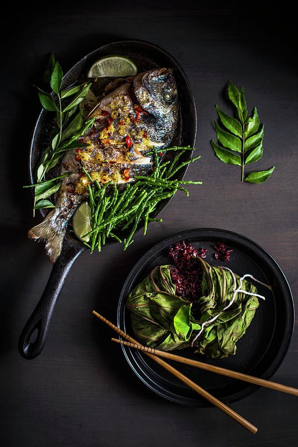 Oriental Style Grilled Seabass With Red Rice And Queller Photograph by Magdalena Hendey