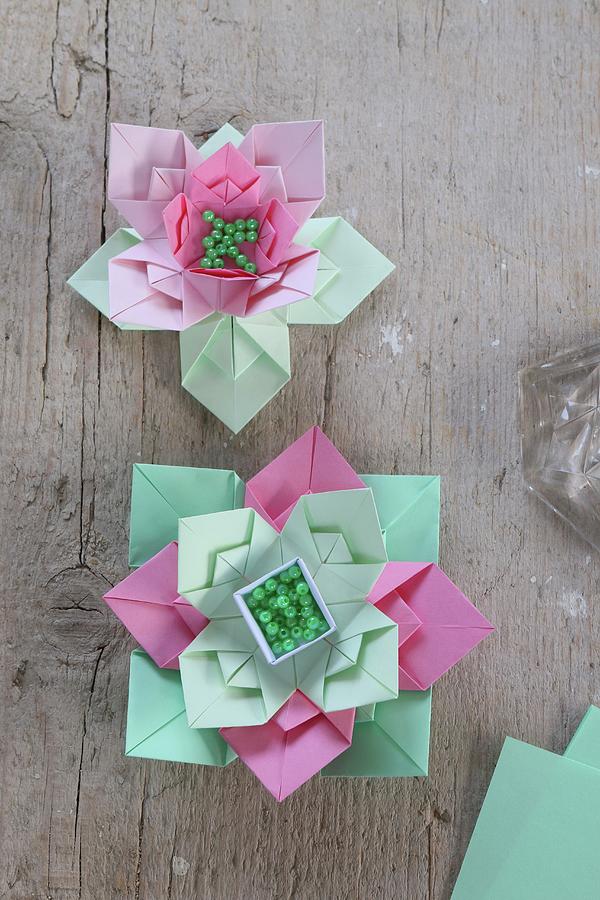 Origami Flowers Made From Paper Of Various Colours And Beads Photograph ...