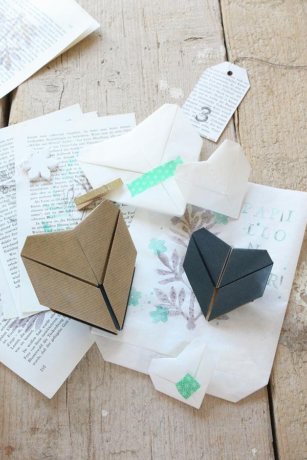 Origami Hearts And Washi Tape On Printed Paper Photograph by Regina Hippel