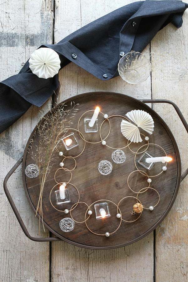 Original Arrangement On Table With Glass, Wire Balls, Beads, Rings And Candles On Wooden Tray Photograph by Regina Hippel