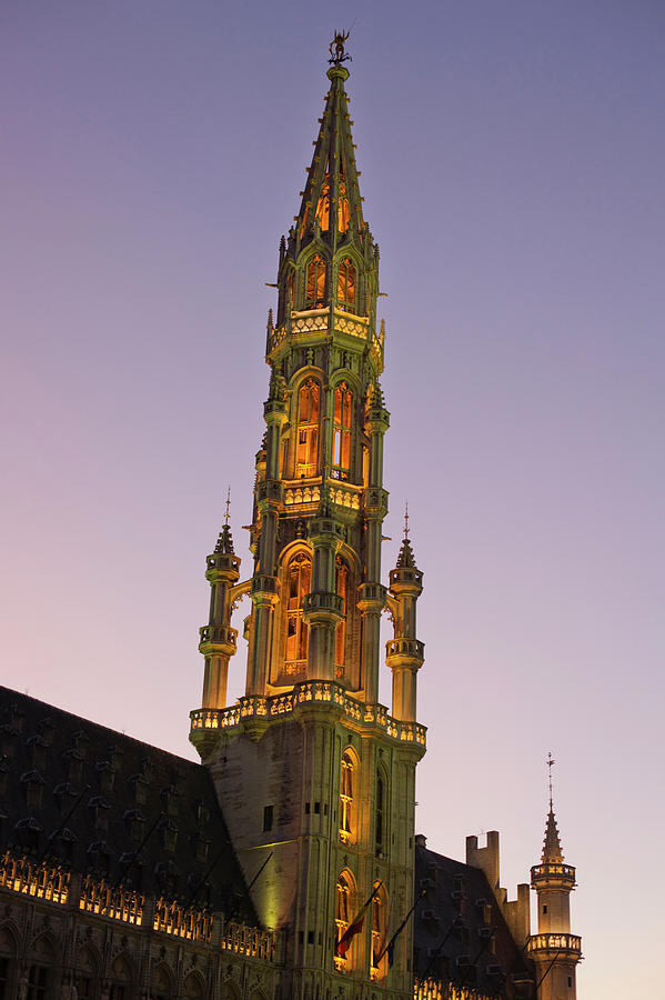 Ornate Tower Lit Up At Night Photograph by Walter Zerla