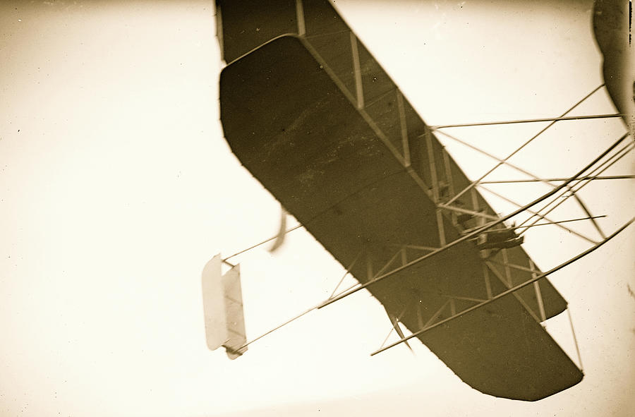 Orville Wright flying in his airplane Painting by 