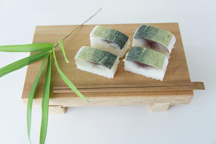Oshi Sushi With Mackerel On A Wooden Slab Photograph by Martina Schindler