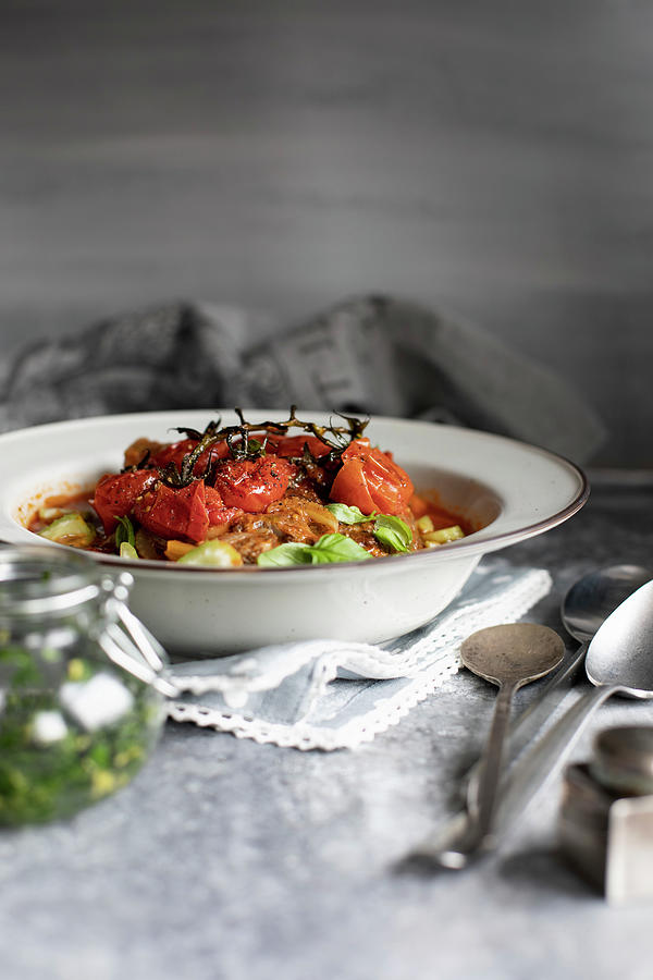 Osso Bucco With Vine Tomatoes Photograph by Lilia Jankowska